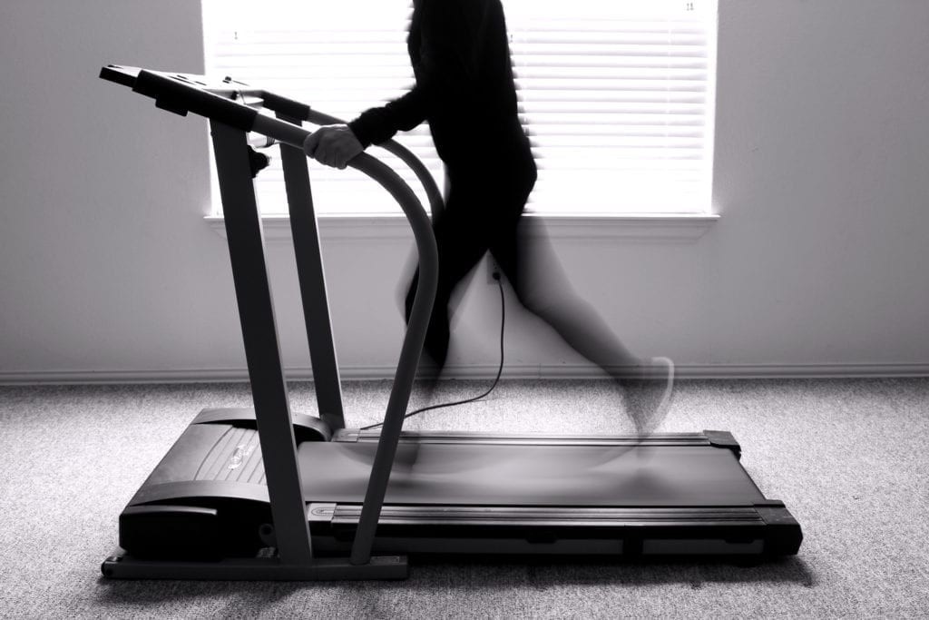 Working out on treadmill at home